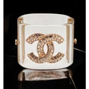 CHANEL Clear Acrylic Cuff with Gold Crystal CC Logo